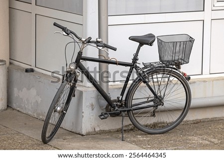 Similar – Foto Bild Fahrrad auf dunkler Straße geparkt