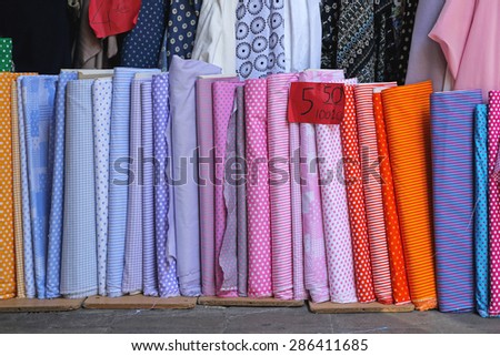 Colorful Textile Fabric Rolls in Material Shop