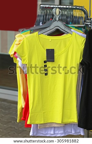 Yellow T Shirts on the Hanger in Shop