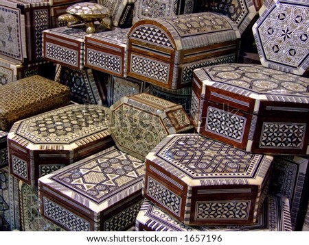 Bunch of handicraft wooden boxes selling on a market