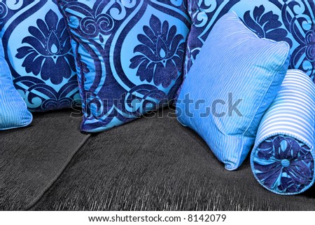 Blue decorative pillows made from floral textile
