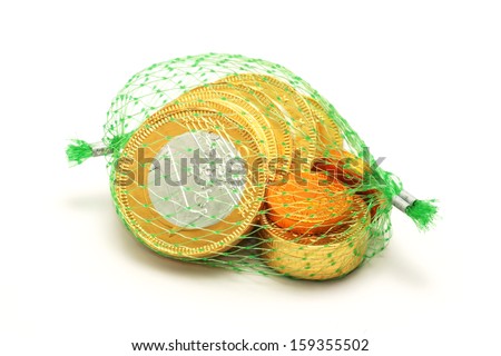 Euro chocolate wrapped in metal foil and packaged in a green grid