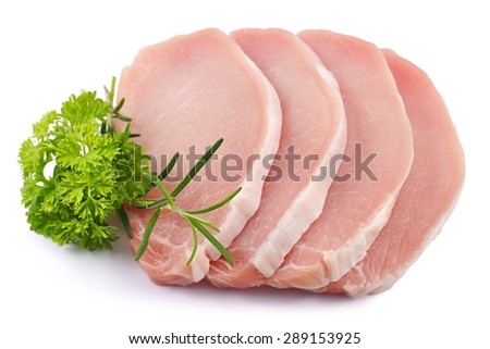 Meat, pork, parsley, rosemary, slices pork loin on a white background