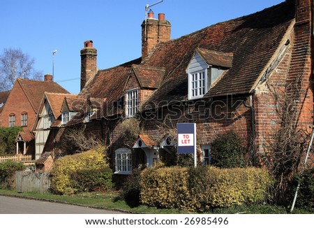 Attractive brick built cottage with a to let sign