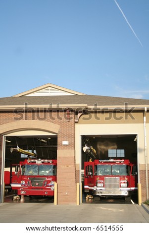 Fire truck in front of fire house
