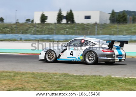 ISTANBUL - MAY 12: Umit Ulku drives a Maxi class Porsche 997 GT3 car during 2012 Turkish Touring Car Championship, Istanbul Park on May 12, 2012 in Istanbul, Turkey.
