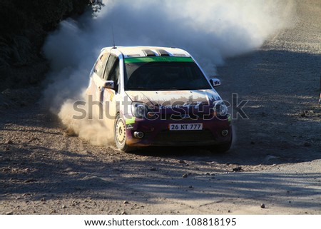 ISTANBUL - JUNE 10: Ozgur Gur drives a Team47 Motorsport Ford Fiesta St car during 33th Istanbul Rally championship, Yesilvadi Stage on June 10, 2012 in Istanbul, Turkey.