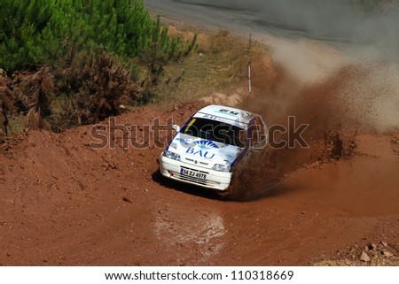 ISTANBUL - JULY 07: Can Altinok drives a Team 47 Motorsports team Fiat Palio car during 41st Bosphorus Rally ERC Championship, Gocbeyli Stage on July 7, 2012 in Istanbul, Turkey.