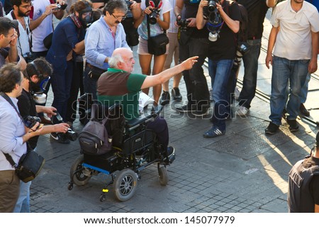 ISTANBUL - JULY 06: Disabled man protests police intervention during protests on July 06, 2013 in Istanbul, Turkey. People are protesting the prohibition of entry to Gezi Park since 15 June 2013