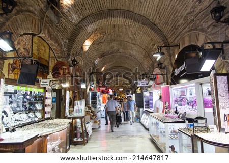 IZMIR, TURKEY - JULY 21, 2014: People shopping in old Kizlaragasi Bazaar that was built in 1744 and is one of the most popular traditional Bazaar in Izmir.