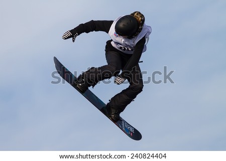 ISTANBUL, TURKEY - DECEMBER 20, 2014: Urska Pribosic jump in FIS Snowboard World Cup Big Air. This is first Big Air event for both, men and women.