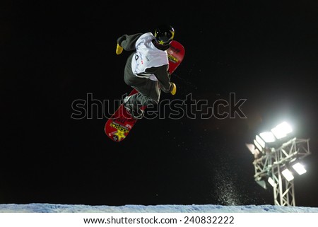 ISTANBUL, TURKEY - DECEMBER 20, 2014: Brandon Davis jump in FIS Snowboard World Cup Big Air. This is first Big Air event for both, men and women.