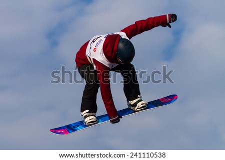 ISTANBUL, TURKEY - DECEMBER 20, 2014: Loranne Smans jump in FIS Snowboard World Cup Big Air. This is first Big Air event for both, men and women.