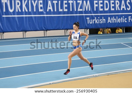 ISTANBUL, TURKEY - FEBRUARY 21, 2015: Greek athlete Anastasia Karakatsani running during Balkan Athletics Indoor Championships in Asli Cakir Alptekin Athletics hall.
