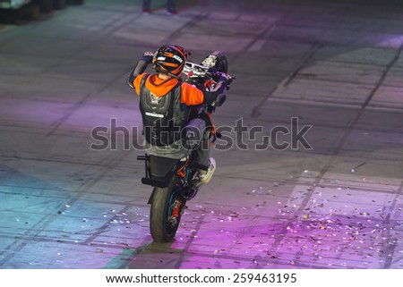 ISTANBUL, TURKEY - FEBRUARY 01, 2015: Driver Birkan Polat make motorcycle stunt show during Monster Hot Wheels in Sinan Erdem Dome.