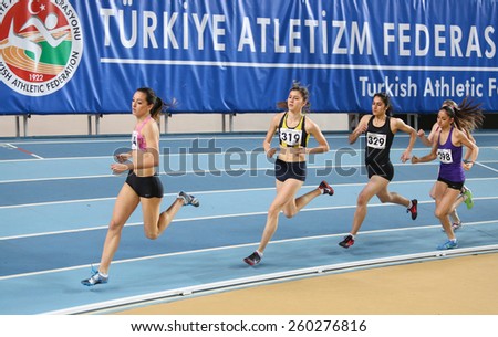 ISTANBUL, TURKEY - FEBRUARY 15, 2015: Athletes running during Turkcell Juniors and Seniors Athletics Turkey Indoor Championship in Asli Cakir Alptekin Athletics hall