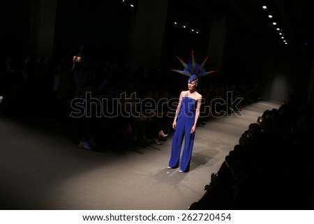 ISTANBUL, TURKEY - MARCH 17, 2015: A model showcases one of the latest creations by Merve Bayindir in Mercedes-Benz Fashion Week Istanbul