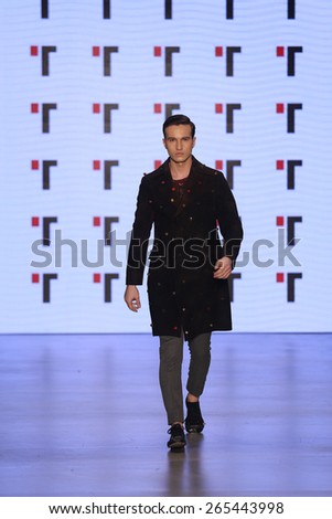 ISTANBUL, TURKEY - MARCH 20, 2015: A model showcases one of the latest creations by Tween in Mercedes-Benz Fashion Week Istanbul