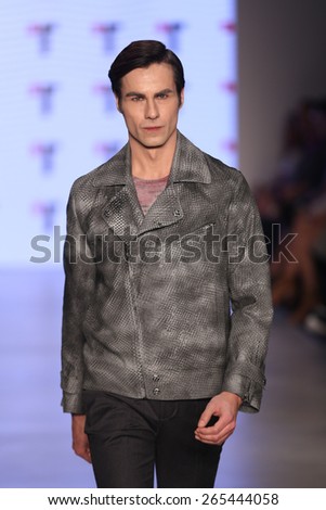 ISTANBUL, TURKEY - MARCH 20, 2015: A model showcases one of the latest creations by Tween in Mercedes-Benz Fashion Week Istanbul
