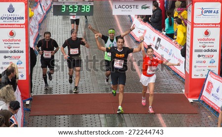 ISTANBUL, TURKEY - NOVEMBER 16, 2014: People in finish line of 36th Istanbul marathon.