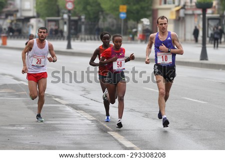 ISTANBUL, TURKEY - APRIL 26, 2015: Athletes are running in Old Town streets of Istanbul during Vodafone 10th Istanbul Half Marathon