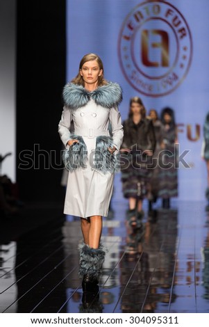 ISTANBUL, TURKEY - NOVEMBER 20, 2014: Models showcase one of the latest fashion creations in Istanbul Leather Fair