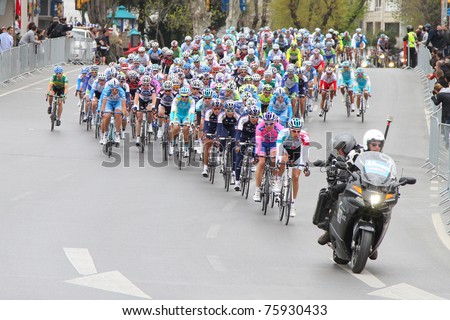 ISTANBUL - APRIL 24: Cyclists in action during the 1st stage of 47th Presidential Cycling Tour of Turkey on April 24, 2011 in Istanbul, Turkey.