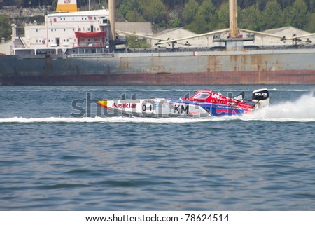 ISTANBUL, TURKEY - MAY 15: Saruhan TAN drives a YKM Sport Offshore 225 boat during World Offshore 225 Championship, Halic stage on May 15, 2011 in Istanbul, Turkey