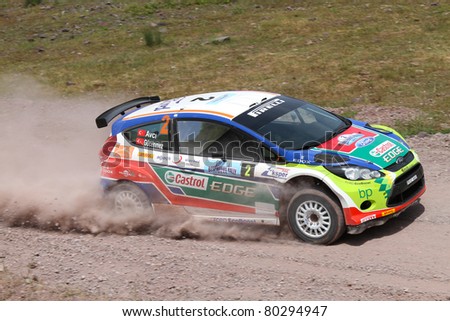 ISTANBUL - JUNE 04: Yagiz Avci drives a Castrol Ford Team Turkey Ford Fiesta S2000 car during 40th Bosphorus Rally 2011 ER championship, Darlik Stage on June 04, 2011 in Istanbul, Turkey