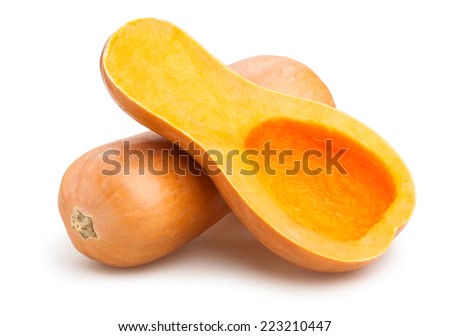 Similar – Image, Stock Photo Halved butternut squash on plate with cutlery and herbs at grey concrete kitchen table background.