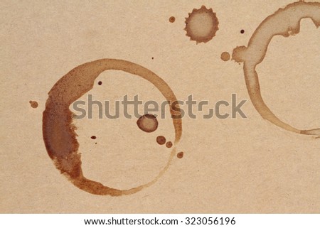 Coffee cup rings stains on a brown paper texture