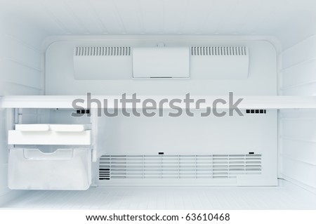 An empty freezer of a refrigerator
