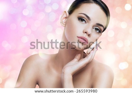 Pretty lady enjoy a flawless skin, skin care concept / photoset of attractive brunette girl on blurred pink background with bokeh