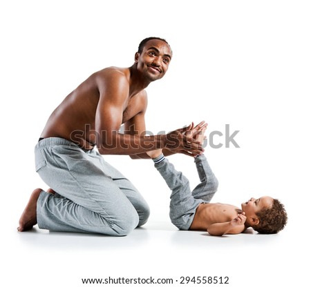 Healthy morning stretching - man with son doing gymnastic exercise / photo set of sporty muscular Hispanic shirtless fitness man with his son over white background