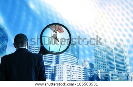 realtor at work concept with magnifier looking for new house