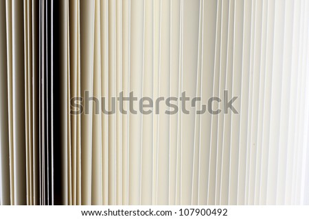 Closeup of vintage open book paper sheets texture background