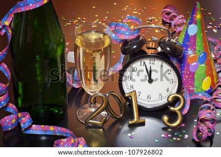 2013 happy new year with clock and champagne party