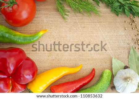 Vegetables and spices border and blank cutting desk board for recipes