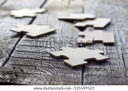 Similar – Image, Stock Photo Wooden puzzle pieces as background