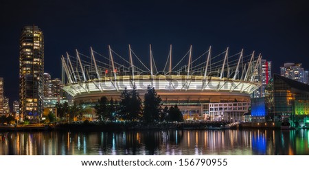 VANCOUVER, CANADA - SEPTEMBER 19, 2013: BC Place stadium at night on September 19, 2013: It is a year-round, open-air facility - the largest multipurpose venue in the Province of British Columbia.