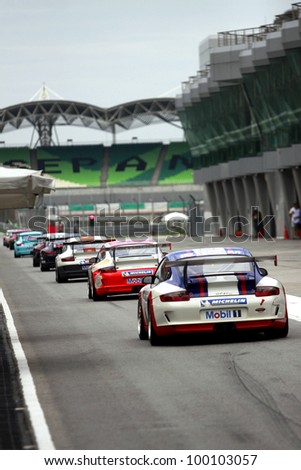 SEPANG, MALAYSIA - DECEMBER 5: Cars making their way to the main track for warm up sesion during the MHH Super Series Round 5 on December 5, 2009 in Sepang, Malaysia