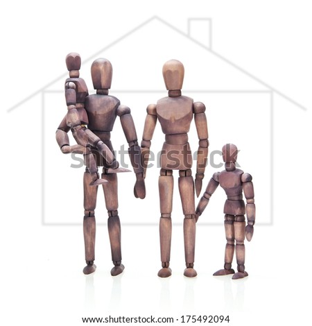 Brown mannequin family in front of a house outline
