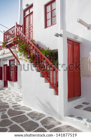 Classical Greek architecture of the streets - stairs, balconies, painted pavement