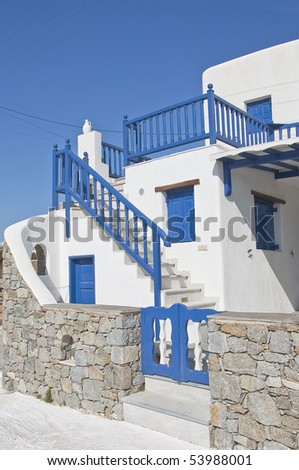White and blue colors in the Greek architecture. Classic home on the islands in Greece ...