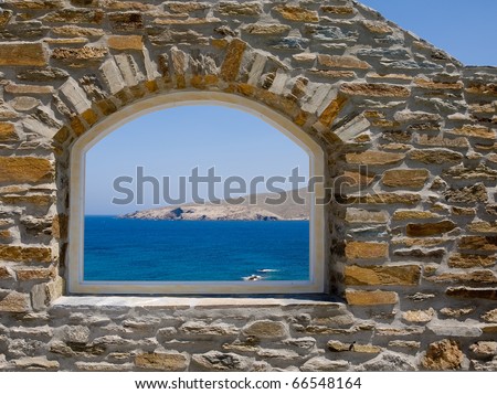 Arched window overlooking the sea.