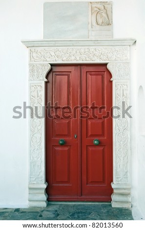 Red door museum, surrounded by marble.