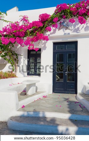 Flowering Bougainvillea Around The Building On The Island Of Mykonos In ...