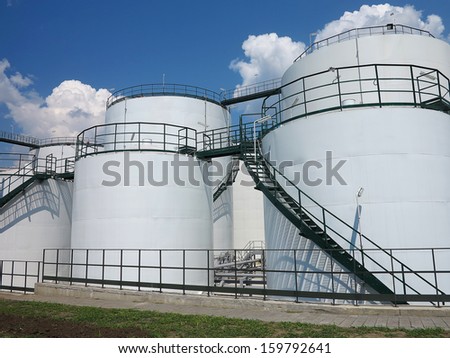 Oil and gas industry. Oil reservoir and storage tank of mineral oil