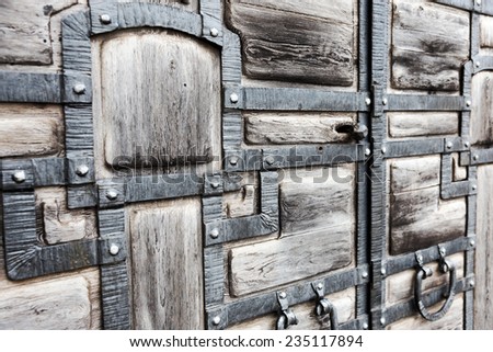Creative textured background old wood, wrought iron stylized medieval, blur perspective