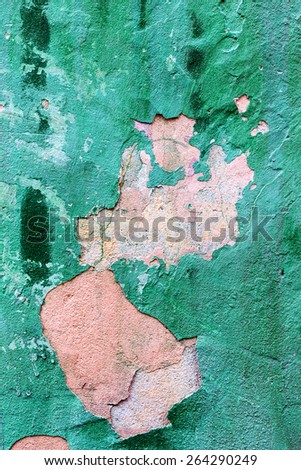 Abstract background concrete painted green paint, weathered with cracks and scratches. Landscape style. Grungy Concrete Surface. Great background or texture.